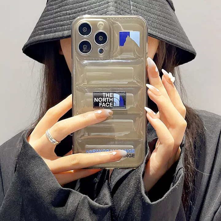 ノースフェイスiPhone16携帯カバー透明ダウンジャケット風