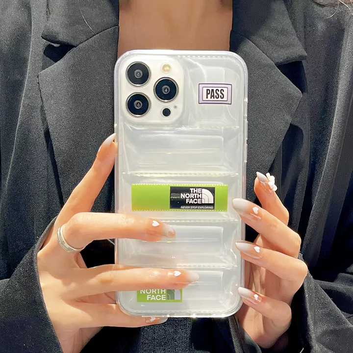 ノースフェイスiPhone16携帯カバー透明ダウンジャケット風